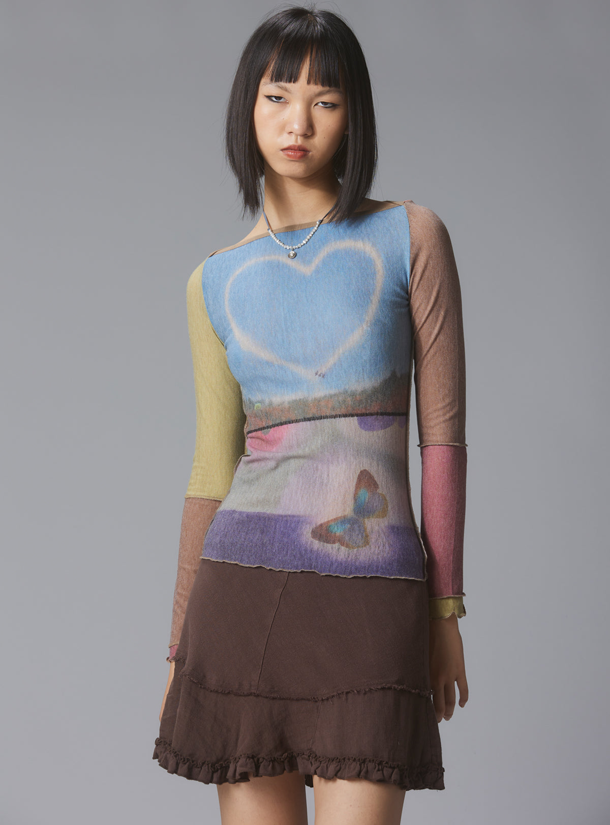 UNIF New | Skye Top Y2K allover-print mesh top with custom artwork