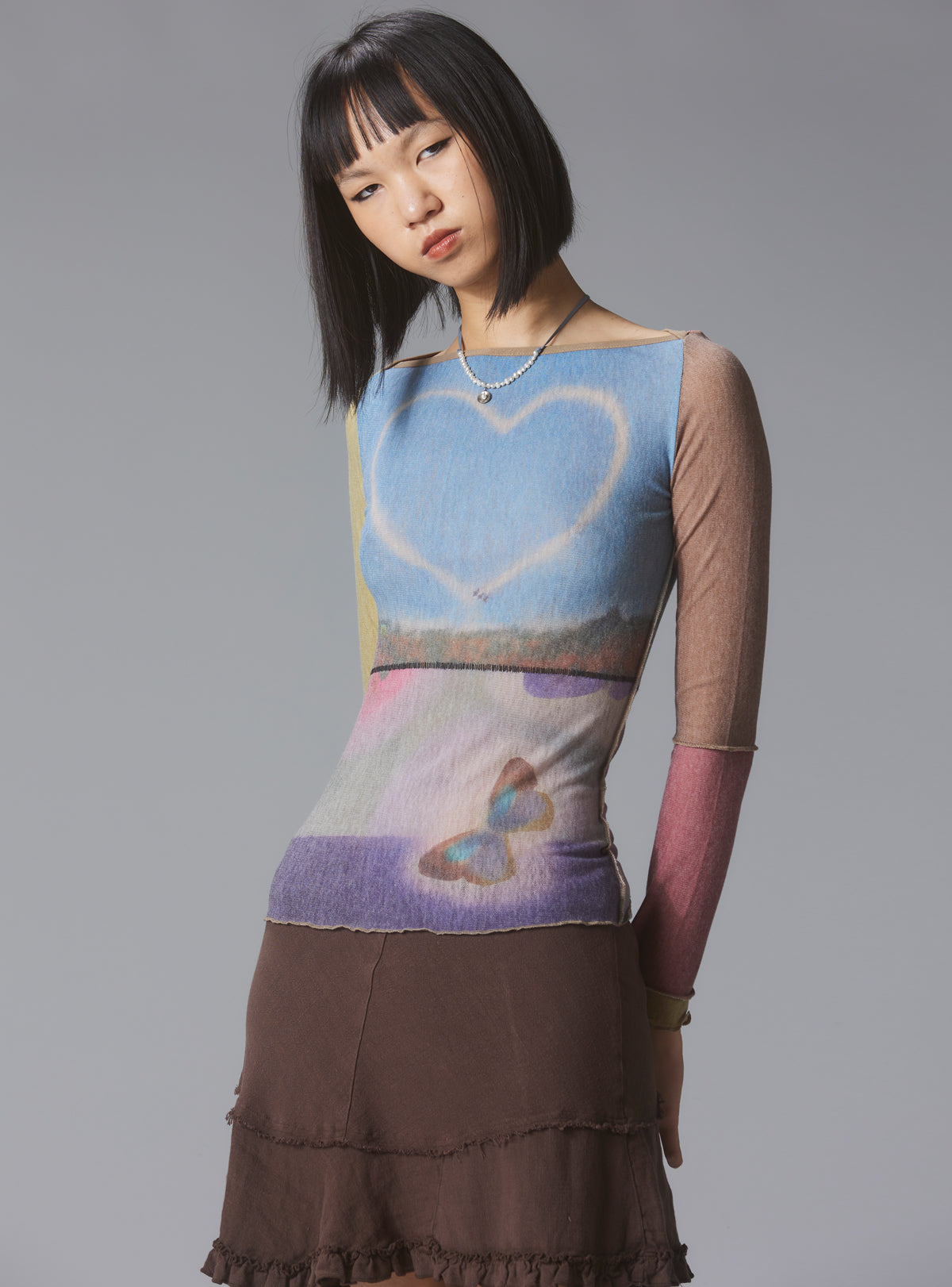 UNIF New | Skye Top Y2K allover-print mesh top with custom artwork