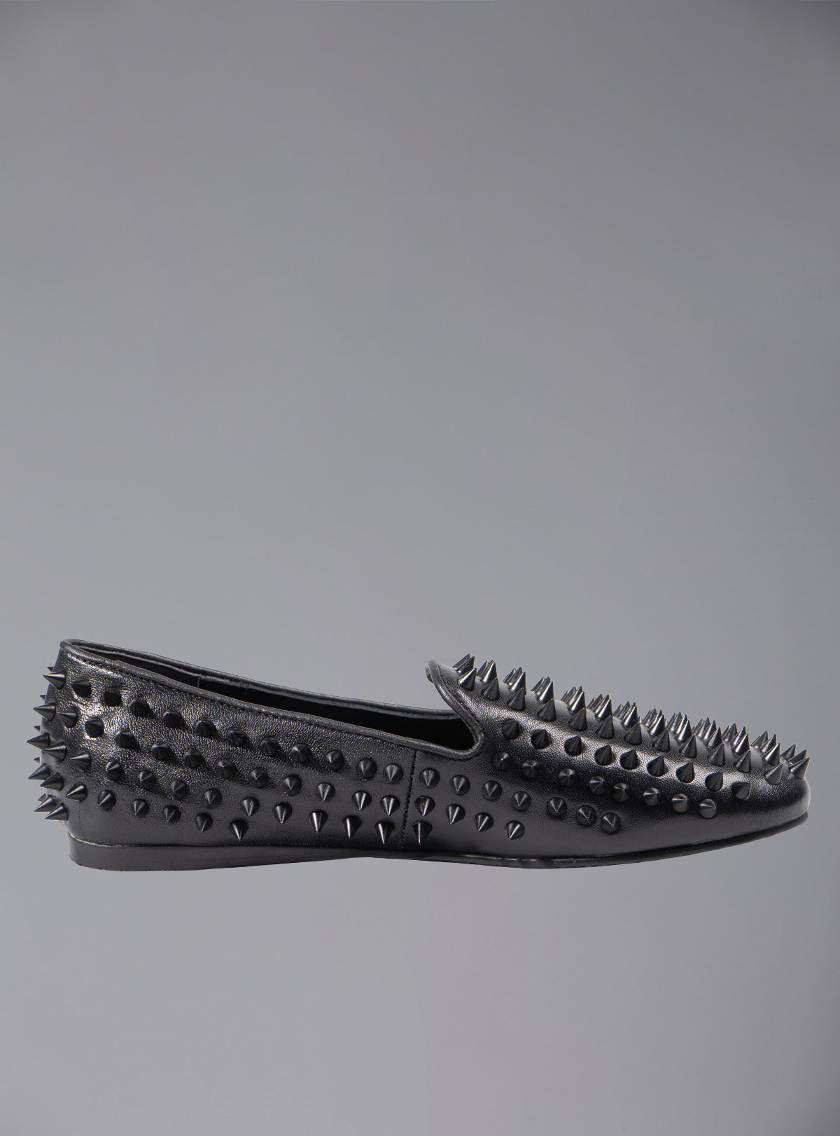UNIF New | UNIF Hellraiser spiked slip on loafer in tonal on colorway.