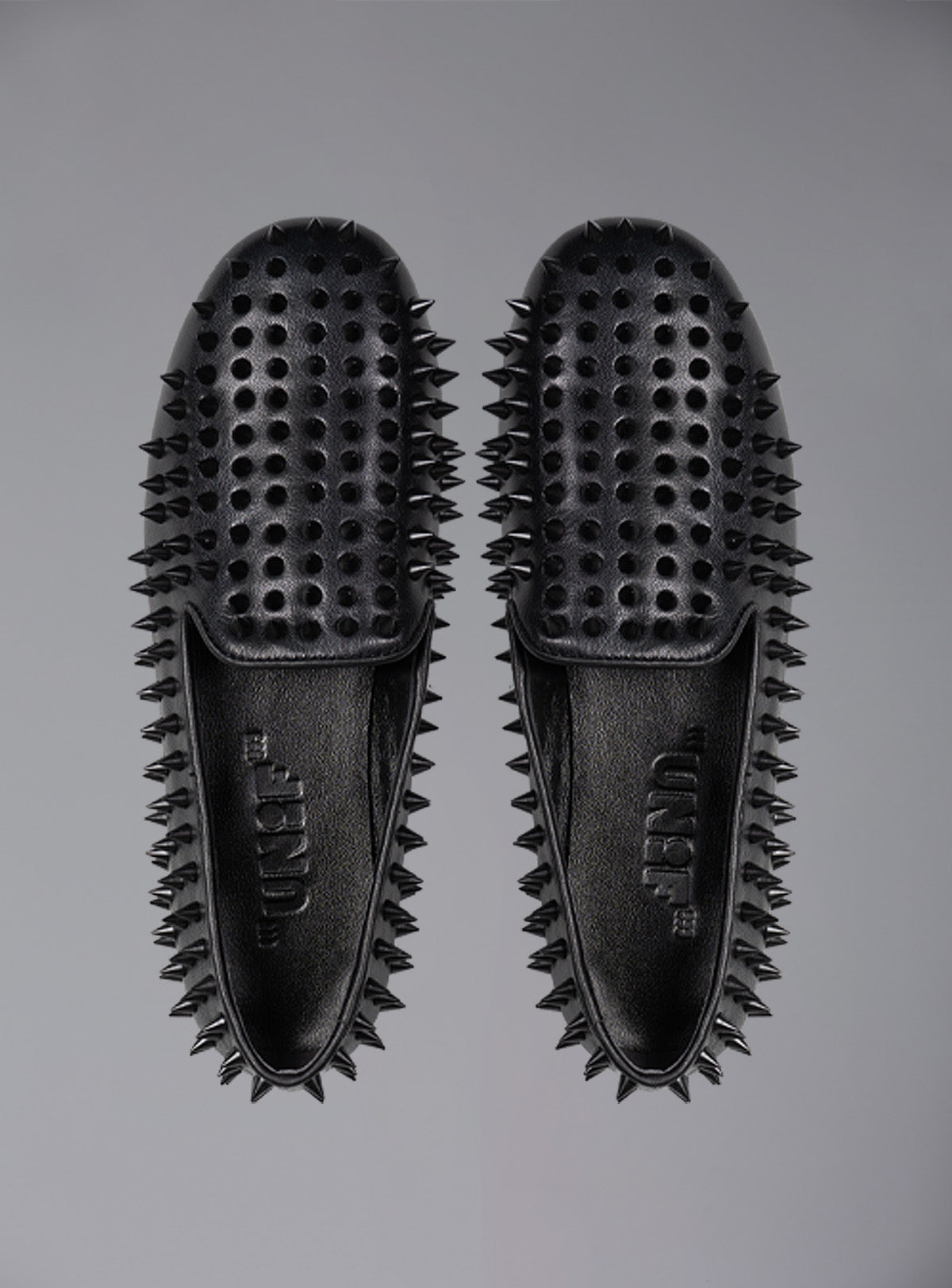 UNIF New | UNIF Hellraiser spiked slip on loafer in tonal on colorway.