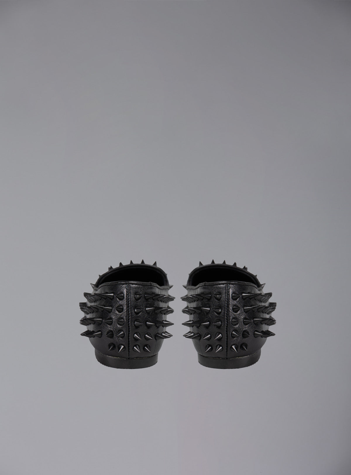 UNIF New | UNIF Hellraiser spiked slip on loafer in tonal on colorway.
